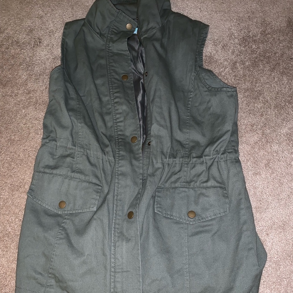 Francesca’s army green zip up and button up vest